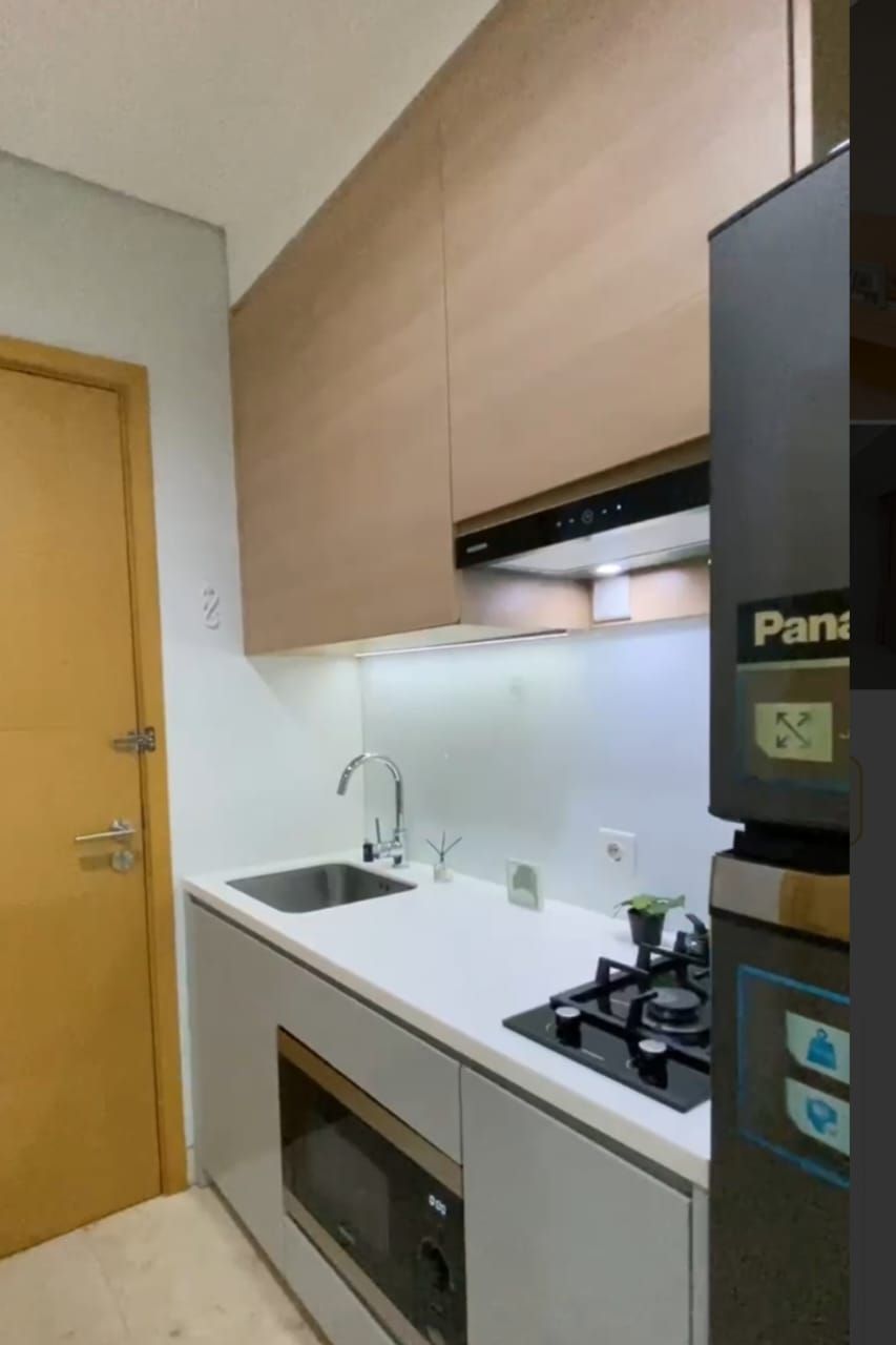 Apartemen Capitol Suites