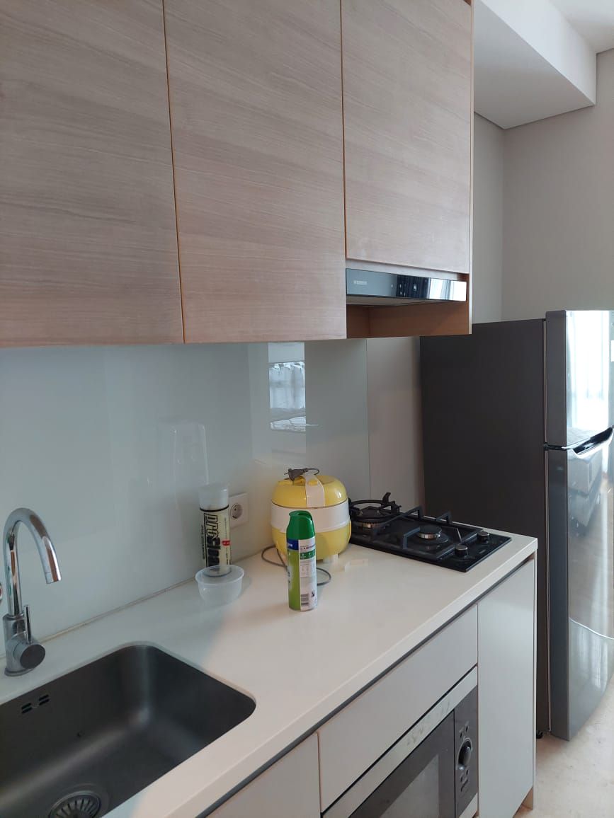 Apartemen Capitol Suites